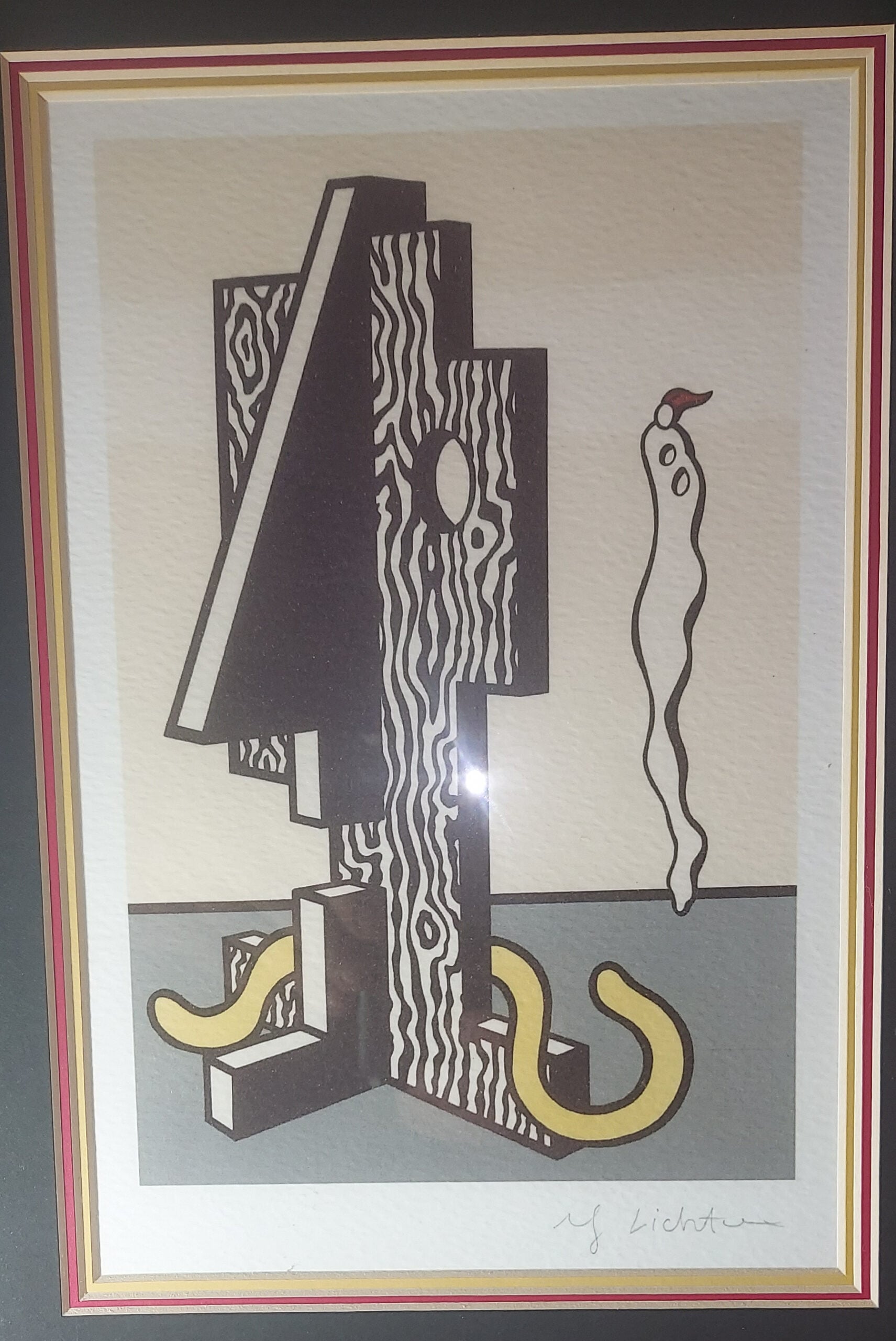 Front view of the alleged Roy Lichtenstein Figures lithograph in its frame. The faux-wood motif of the sculpture, the slender ghostly figure, and the coiled yellow elements near the base are visible.